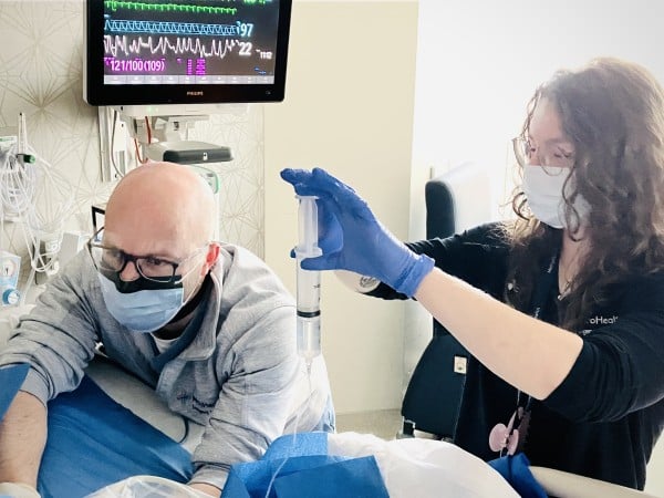 Team performing an ultrasound guided nerve block procedure