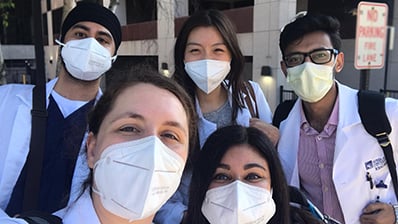 Researchers wearing masks